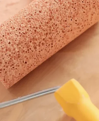 paint roller filled with paint